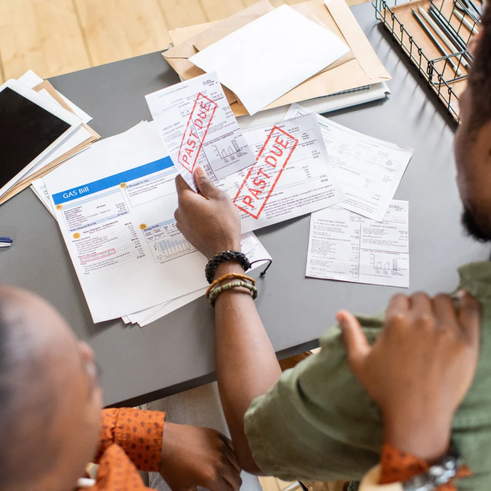 african-woman-comforting-young-man-looking-through-2025-03-14-12-41-02-utc