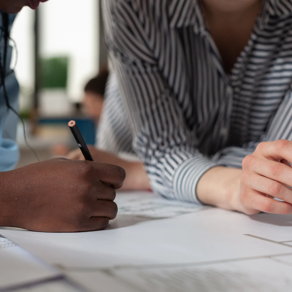 close-up-of-diverse-architect-women-hands-working-2025-02-17-22-35-17-utc
