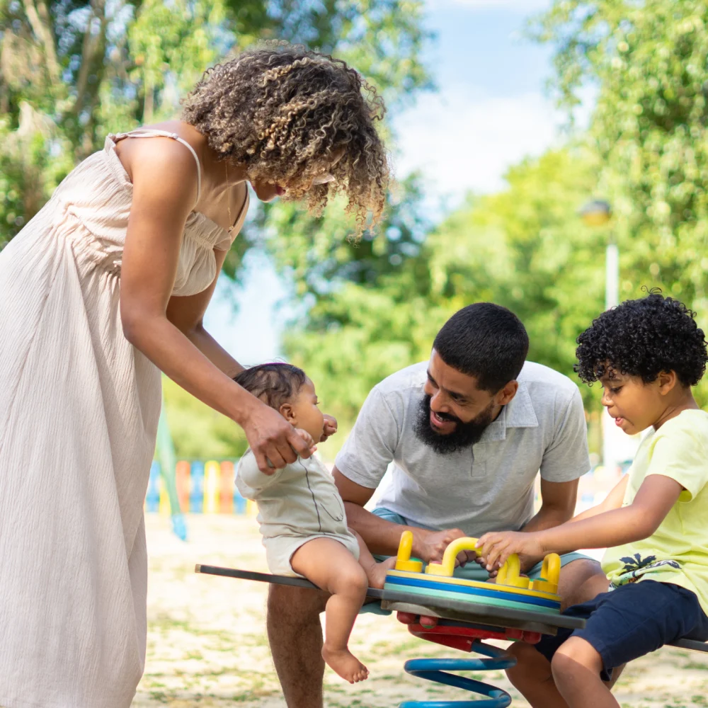latin-family-playing-together-in-a-playground-with-2025-01-08-03-41-40-utc